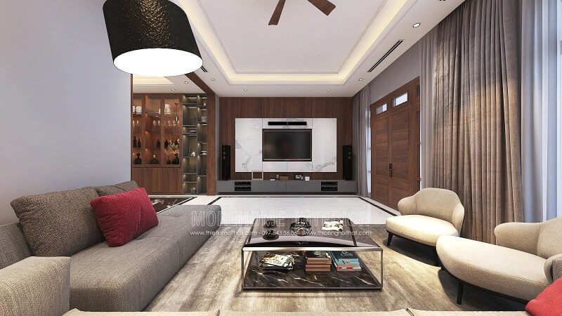Tường phòng khách được thiết kế đẹp với sự kết hợp của đá trắng vân mây và gỗ ốp tường cao cấp để tạo nên điểm nhấn.